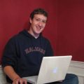 Mark Zuckerberg at his computer